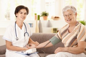 Nurse and patient at home - Acte Santé